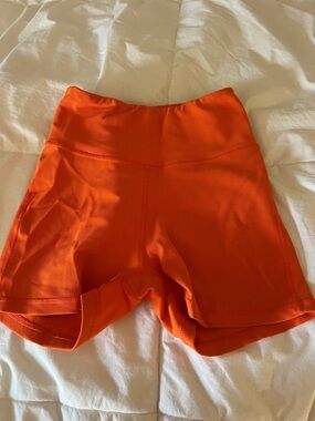 High-Rise Orange Ribbed Bike Shorts